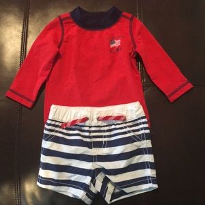 Bathing suit and bathing suit nylon shirt.